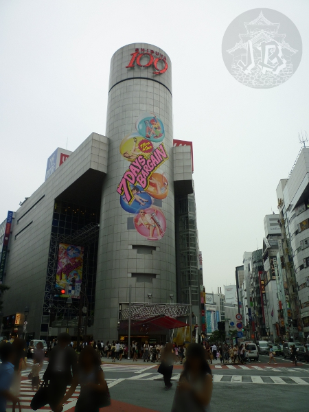 Shibuya 109 building. It is a regular mall with a round tower full of advertisements