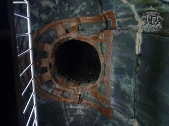 The inside of the Buddha, with reinforced steel around a black hole that is probably the neck