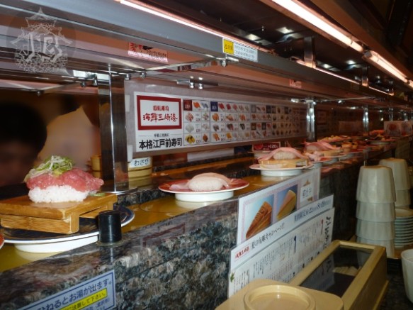 Sushi moving in a conveyor belt-like structure