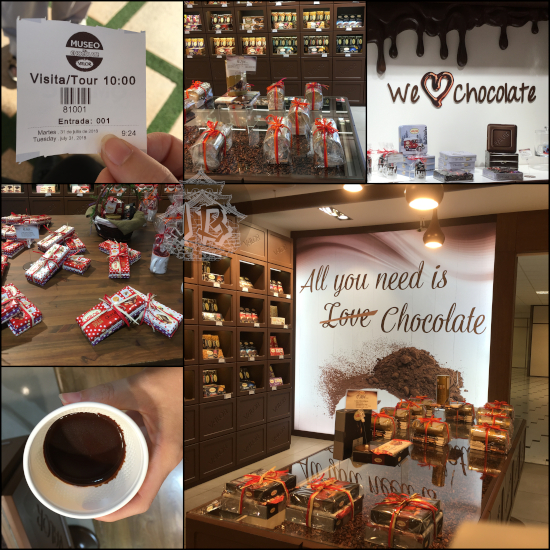 Inside the chocolate factory shop. A painting on the wall says we heart chocolate, another, in the backfround of several chocolate bars packaged as presents, it says All you need is chocolate, with the word love scratched out