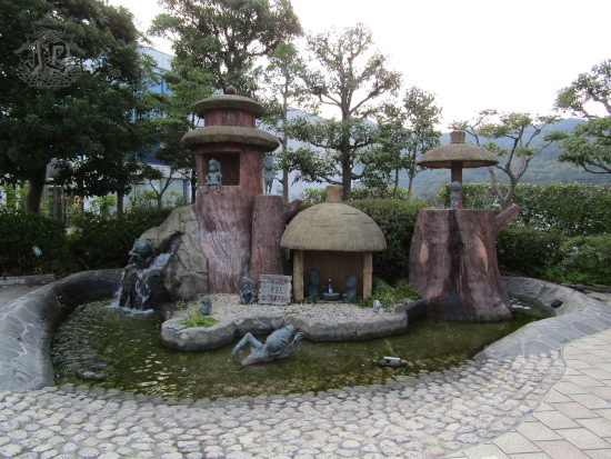 Dry fountain with Ge Ge Ge no Kitarō characters.