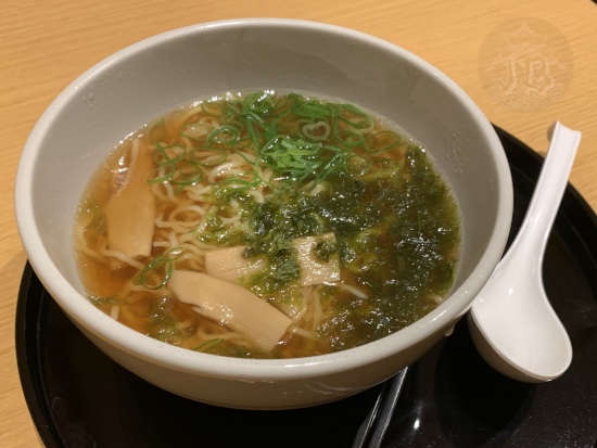 Bowl of free ramen with algae and bamboo sprouts.