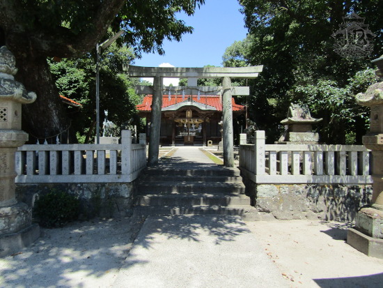 A shrine. The entrance torii frames the main building.