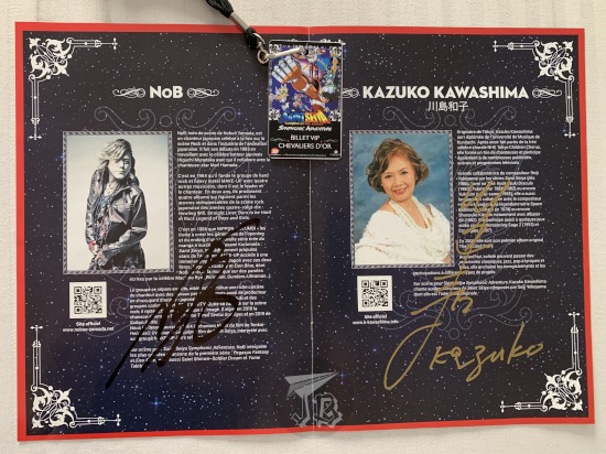 A close up of the booklet - showing the signatures of the singer and the soprano, and the VIP badge.