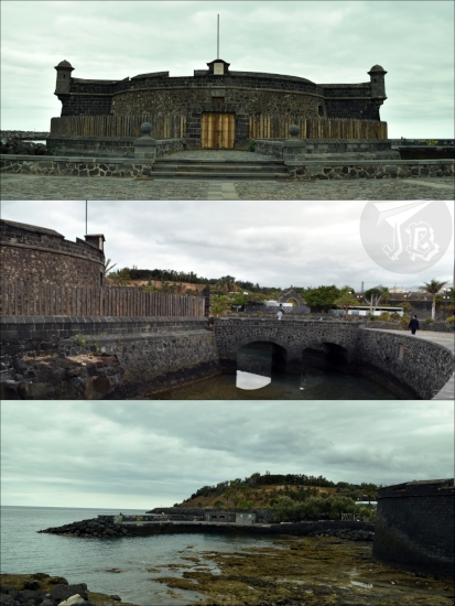 Small castle surrounded by a moat that fills up in high tide.
