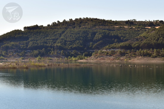 The reservoir. On one of the inlets you can guess the ruins, along with some columns that peek over the water.