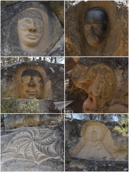 Different faces and shapes carved in sandstone