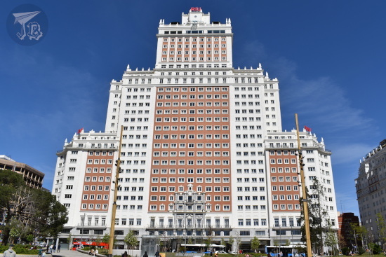 Edificio España - tower like building in reddish and white brick, spanning 26 floors. It is the Riu hotel now.