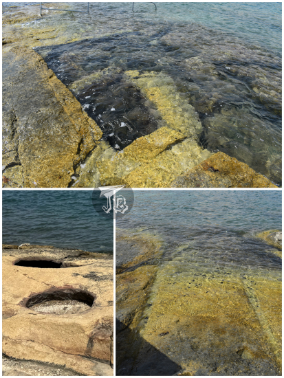 Different constructions near the sea shore: cart ruts, round silos and square artificial pools