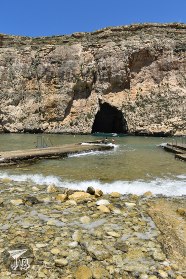Small lagoon connected to the ocean by a cave