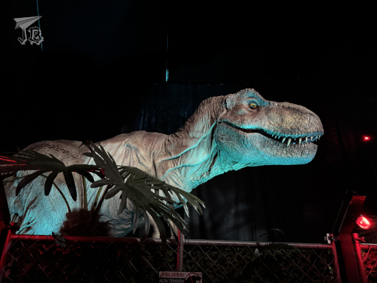 Jurassic World The Exhibition Rexy the T-rex. We know she's the one from the first movie because she has scars down her cheek and neck.