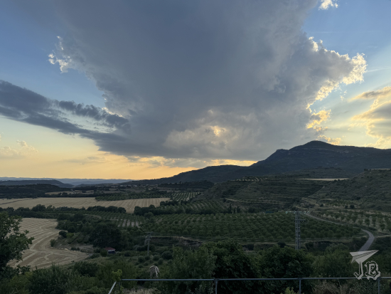 Storm rolling in over the cultivated fields near Loarre