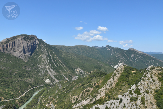 Pyrenees geological structures on the side of the mountain, from the mountain opposite the river - erosive walls, faults and folds