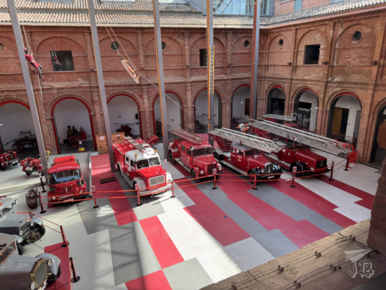 Firefighting museum: collection of vintage vehicles in a brick cloister