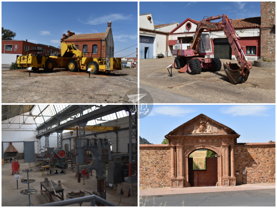 Mining equipment and buildings on the outer part of the mine in Almadén, including an excavator, the mechanical shop and the classic door, in red brick.