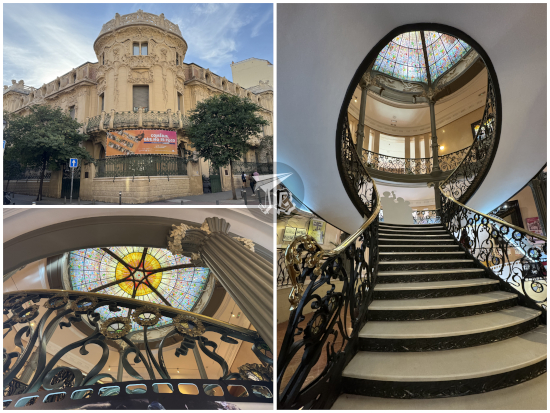 Longoria Palace, a Modernisme building with a stunning skylight with a red stair in a sun and a blue stela. It is over a staircase with an intrincate railing.