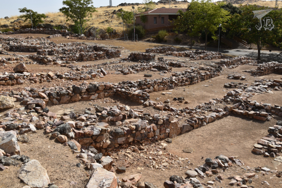 Remains of house blocks in the Iberian village - foundations built in rock.