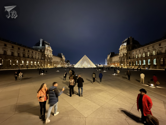 Louvre Pyramid at night.