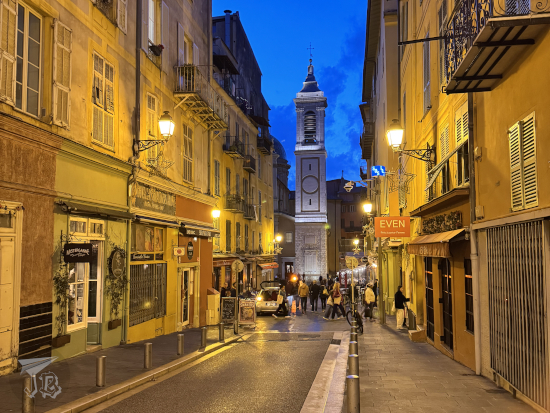Medieval Nice at night, with the cathedral tower at the end.