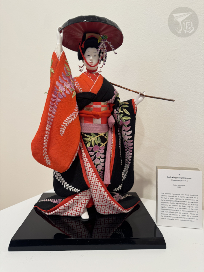 Fuji Musume (Wisteria maiden), a Japanese doll wearing a pretty kimono.