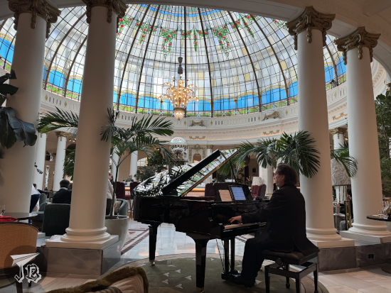 Man playing a grand piano