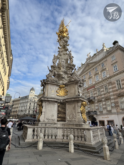 Baroque commemorative column in marble and gold